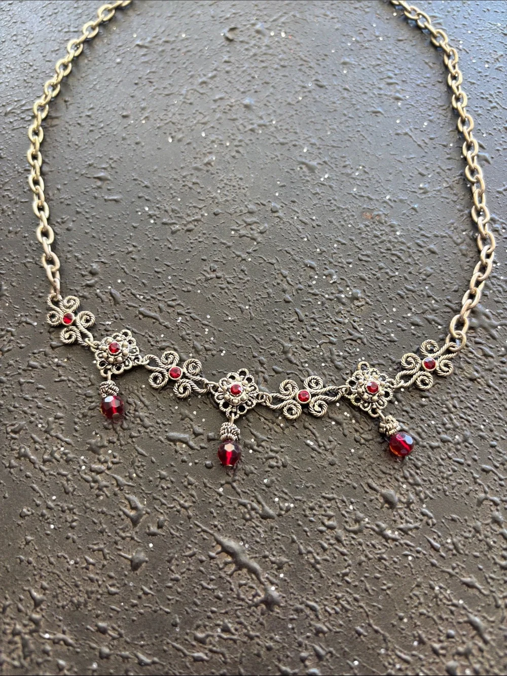 Vintage-Inspired Silver Necklace with Red Gem Accents